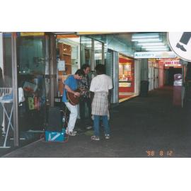 Buskers outside McCarthy's news agency, c.1998