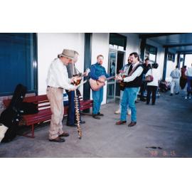 Buskers outside Mount Isa Train Station, c.1998
