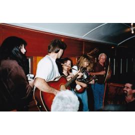 Musicians on train performing, August 1998
