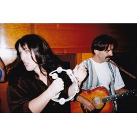 Musicians performing on train, c.1998