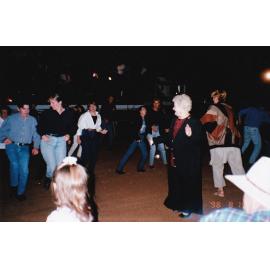 Partygoers dancing at Royal Flying Doctors event, c.1998