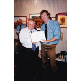 Recipient of award at Civic Centre artwork event, c.1998