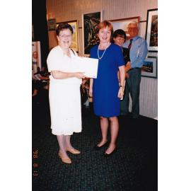 Recipient of award at Civic Centre artwork event, c.1998