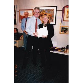 Recipient of award at Civic Centre artwork event, c.1998