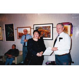 Recipient of award at Civic Centre art event, c.1998