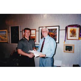 Recipient of award at Civic Centre art event, c.1998
