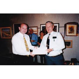 Recipient of award at Civic Centre art event, c.1998