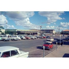 Looking SE to corner Miles and Isa Streets, 1970s.