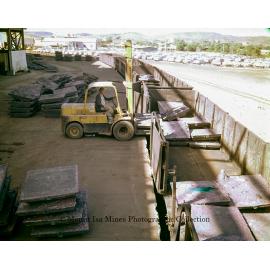 Loading copper into railway wagons, Mount Isa Mines
