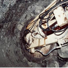 Mobile miner cutting head, Mount Isa Mines, c.1986