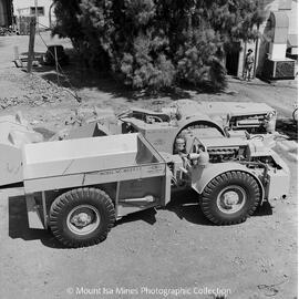 Loader and mining truck at acceptance test, Mount Isa Mines, October 1964