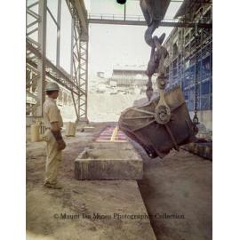 Pouring blister copper into moulds at the Copper Smelter, Mount Isa Mines, c.1970s