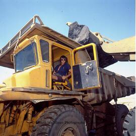 Transport department dump truck being loaded, Mount Isa Mines