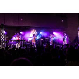 Bjorn Again singing on stage, Isa Street Festival, August 2023