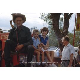 People on stage coach ringer ebbage, Mount Isa Exhibition, Spear Creek, May 1963