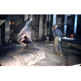 Tapping matte reverberatory furnace at Copper Smelter, Mount Isa Mines, c.1956
