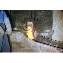 Tapping matte reverberatory furnace at Copper Smelter, Mount Isa Mines, July 1956