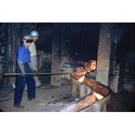 Tapping matte reverberatory furnace at Copper Smelter, Mount Isa Mines, July 1956