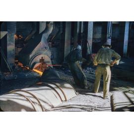 Tapping matte reverberatory furnace at Copper Smelter, Mount Isa Mines, July 1956