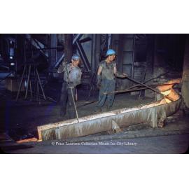 Tapping matte reverberatory furnace at Copper Smelter, Mount Isa Mines, July 1956