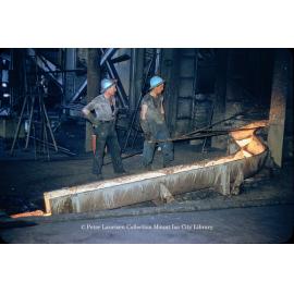Tapping matte reverberatory furnace at Copper Smelter, Mount Isa Mines, July 1956