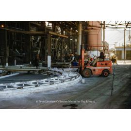 Casting wheel for lead blocks at Lead Smelter, Mount Isa Mines, July 1956