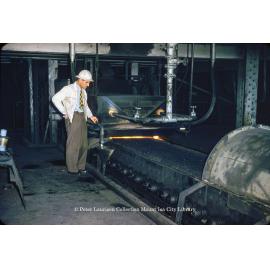 Dwight and Lloyd sinter plant roasting sinter at Lead Smelter, Mount Isa Mines, July 1956