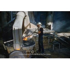 Tapping blast furnace at Lead Smelter, Mount Isa Mines, c.1956